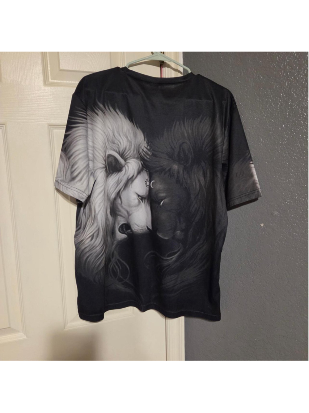 Black & white lion graphic tee with two lions facing each other Athletic wear fa